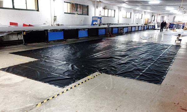 lumber tarp in factory site, steel tarpaulin at working site
